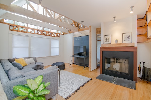 Interior of a modern home with a fireplace and grey couch